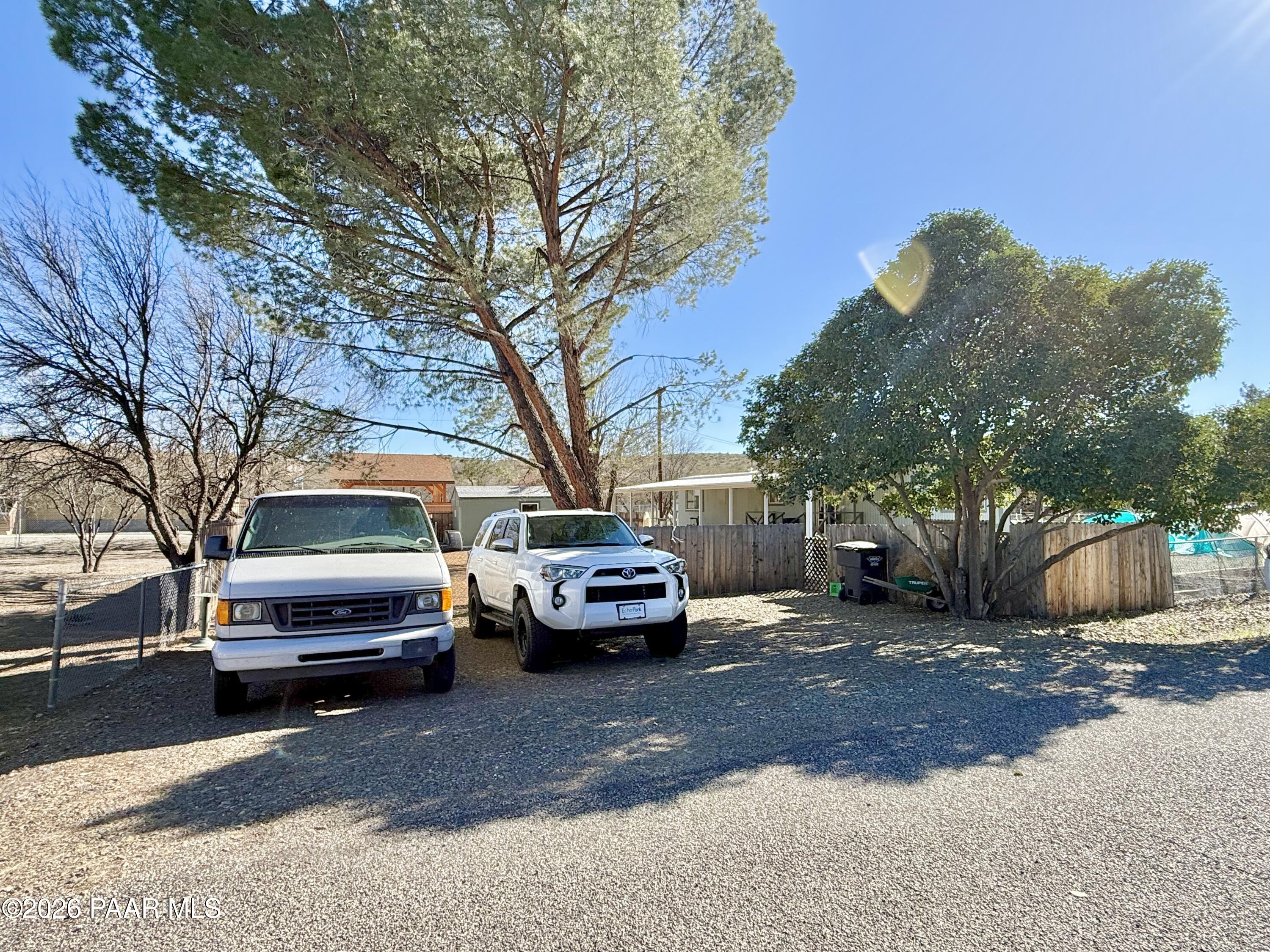 20817 East Butterfield Road Mayer, AZ 86333 - Photo 19 of 24 a view of a car parked in front of a house