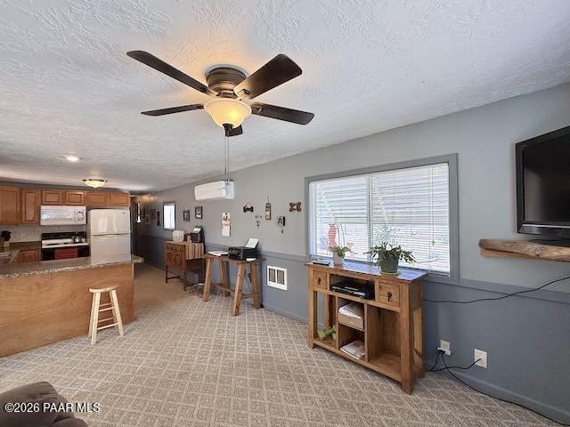 20817 East Butterfield Road Mayer, AZ 86333 - Photo 22 of 47 a room with furniture a flat screen tv and a window