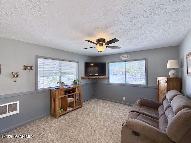 20817 East Butterfield Road Mayer, AZ 86333 - Photo 24 of 47 a living room with furniture and a window