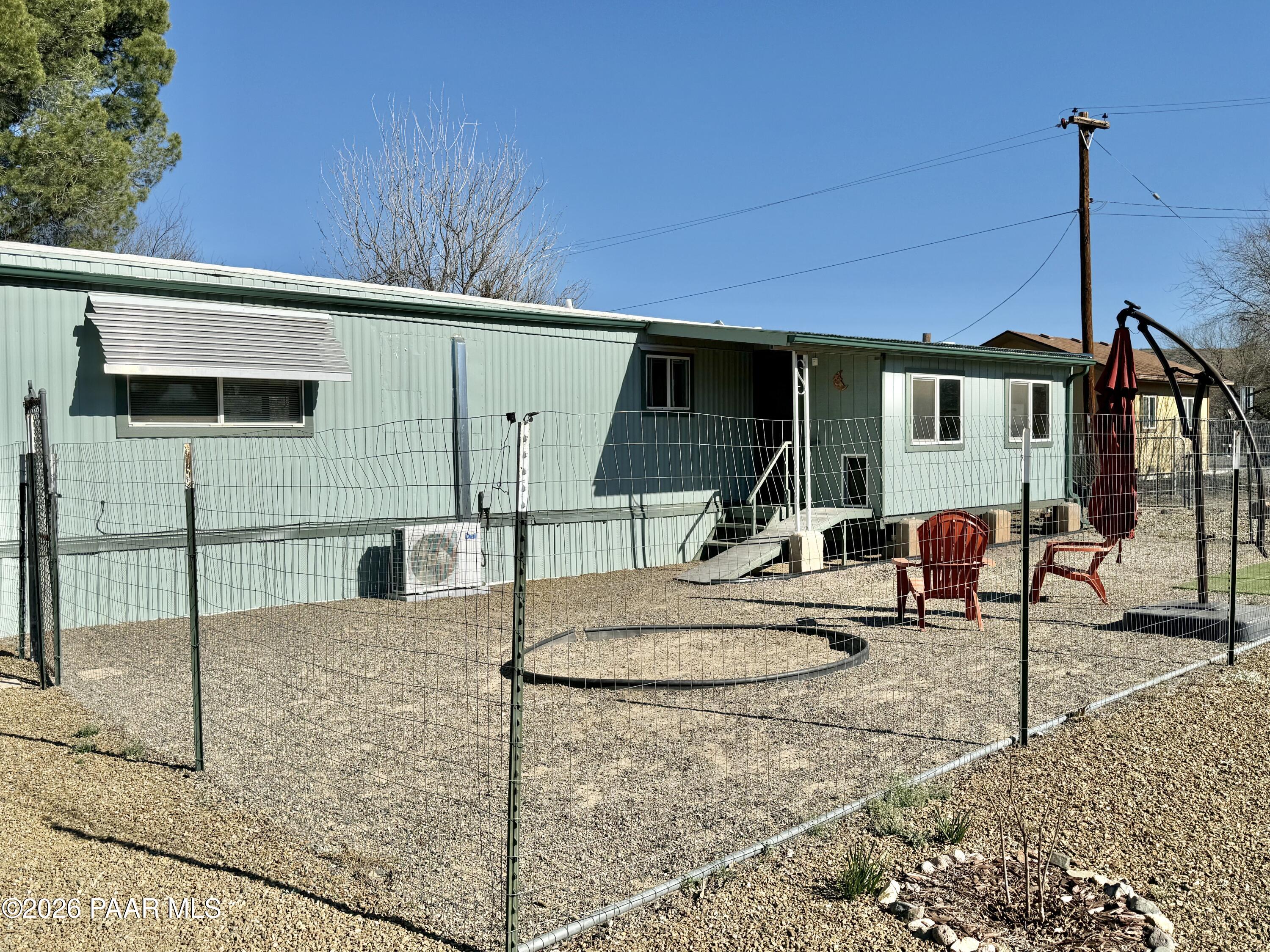 20817 East Butterfield Road Mayer, AZ 86333 - Photo 5 of 24 a view of a house with backyard