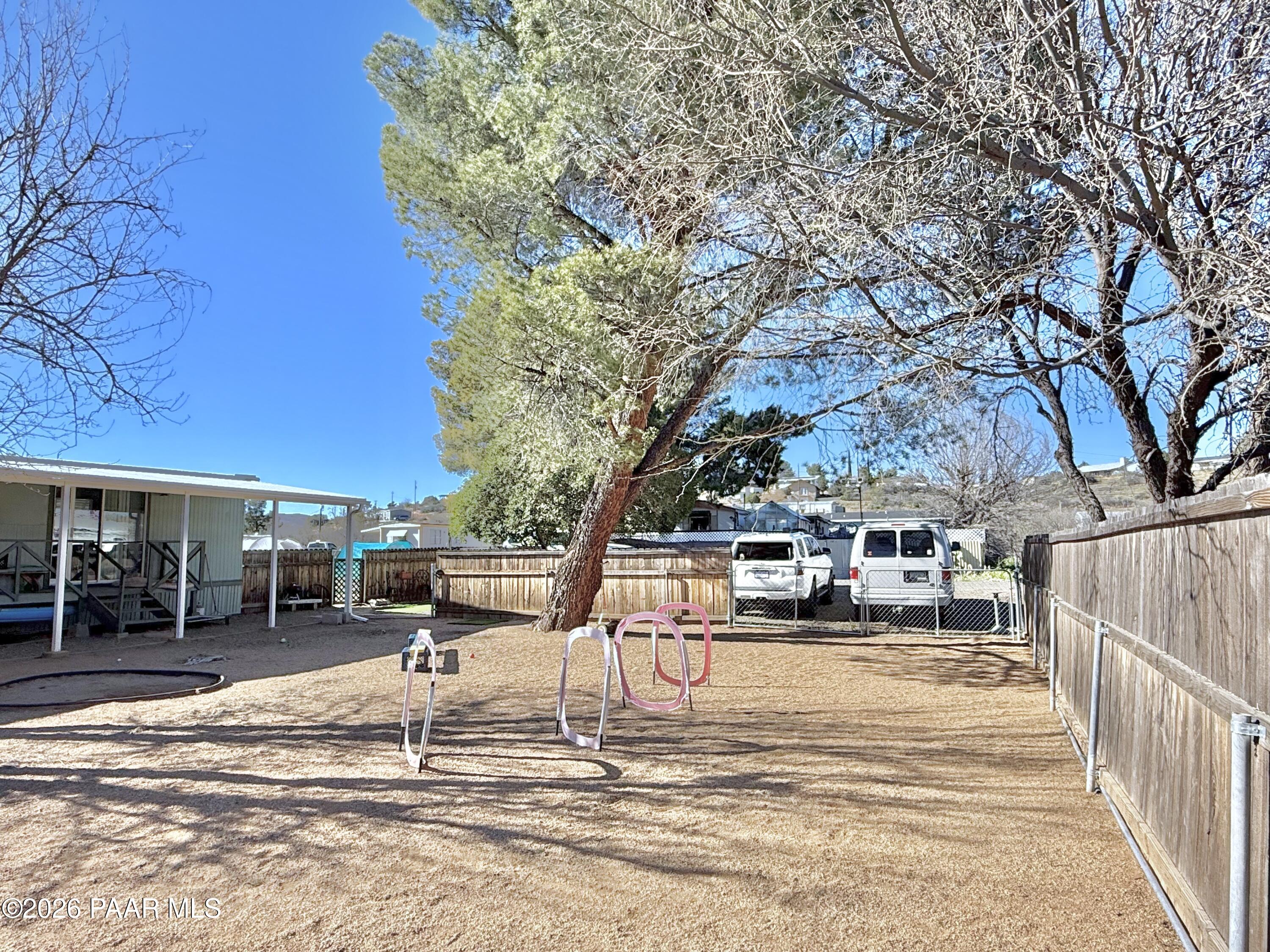 20817 East Butterfield Road Mayer, AZ 86333 - Photo 10 of 24 a view of a patio with a yard