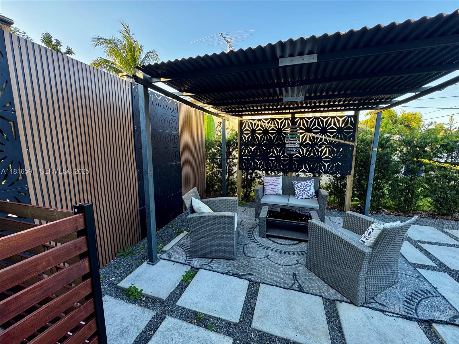 1012 Southwest 3rd Avenue Hallandale Beach, FL 33009 - Photo 19 of 35 a view of porch with seating space