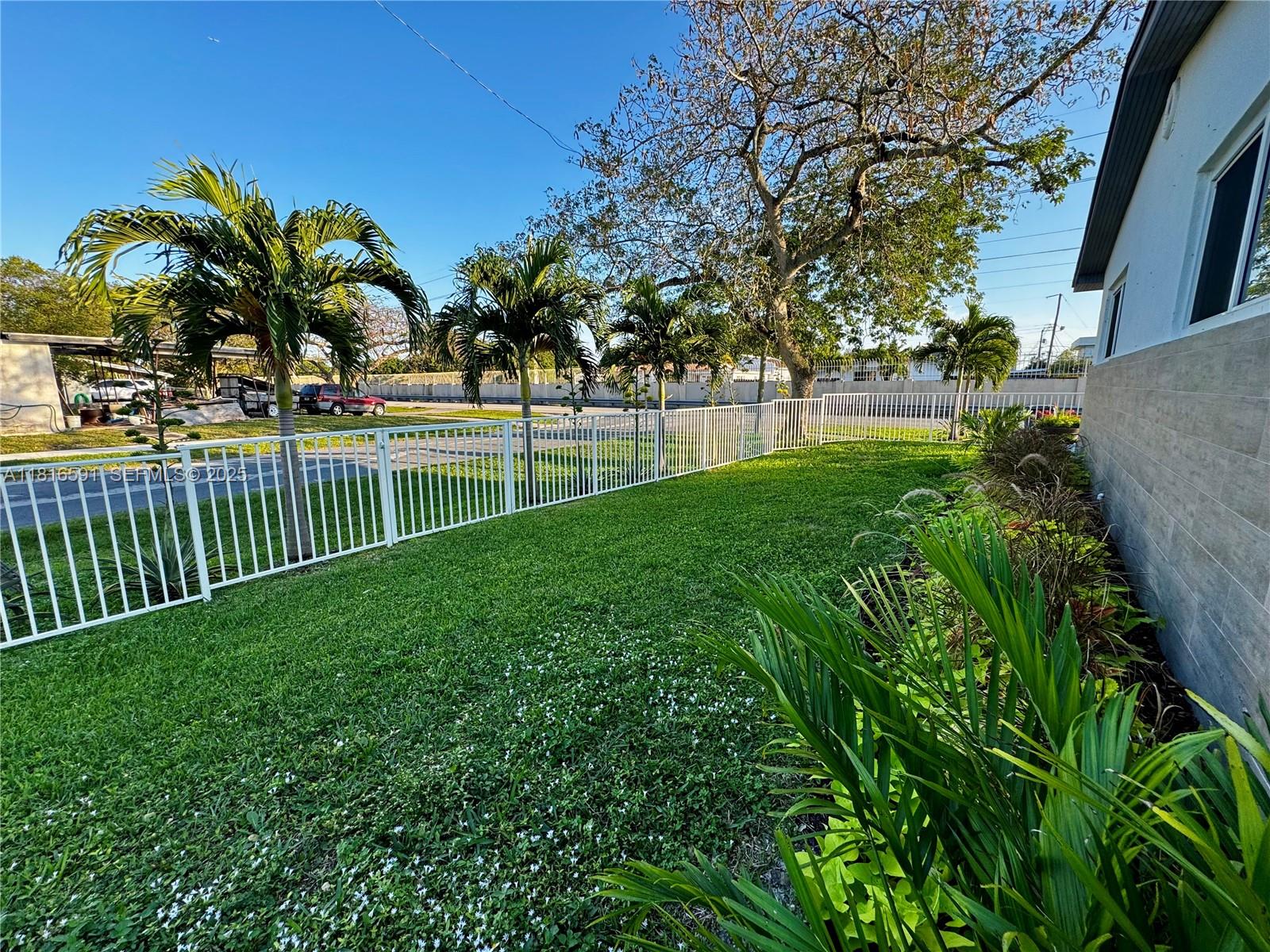 1012 Southwest 3rd Avenue Hallandale Beach, FL 33009 - Photo 20 of 35 a view of a yard and entertaining space