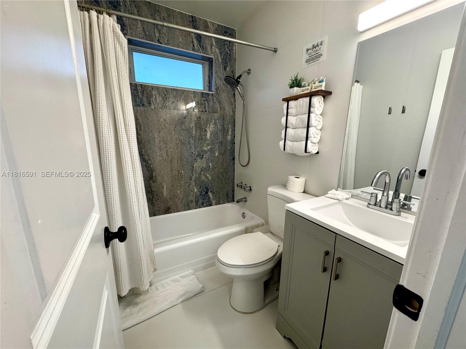 1012 Southwest 3rd Avenue Hallandale Beach, FL 33009 - Photo 30 of 35 a bathroom with a sink toilet and shower