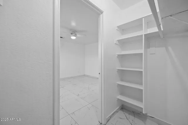 a view of a room with rack on the wall