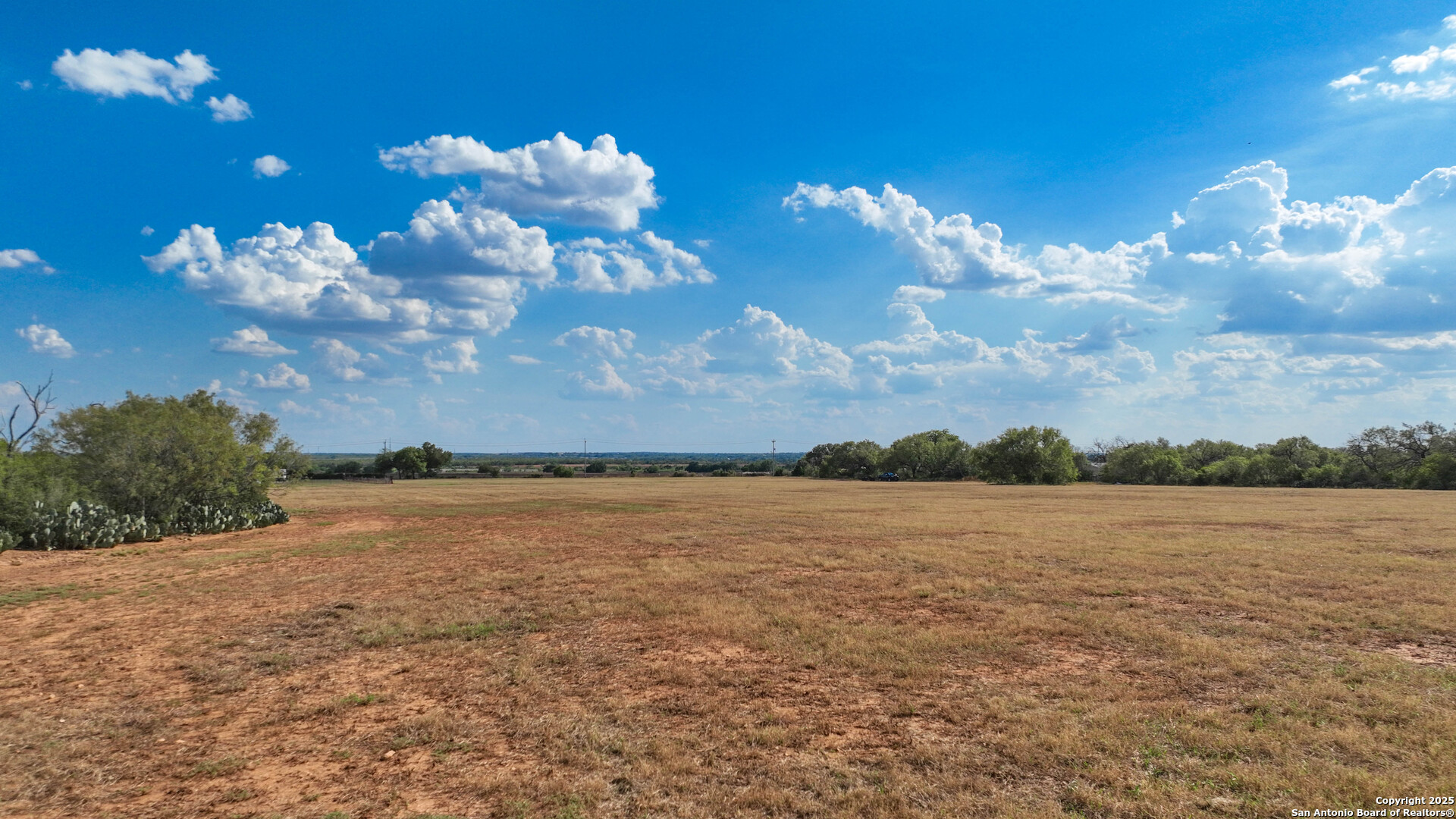 0 Von Ormy Road Von Ormy, TX 78073 - Photo 15 of 20 a view of a lake and sunset