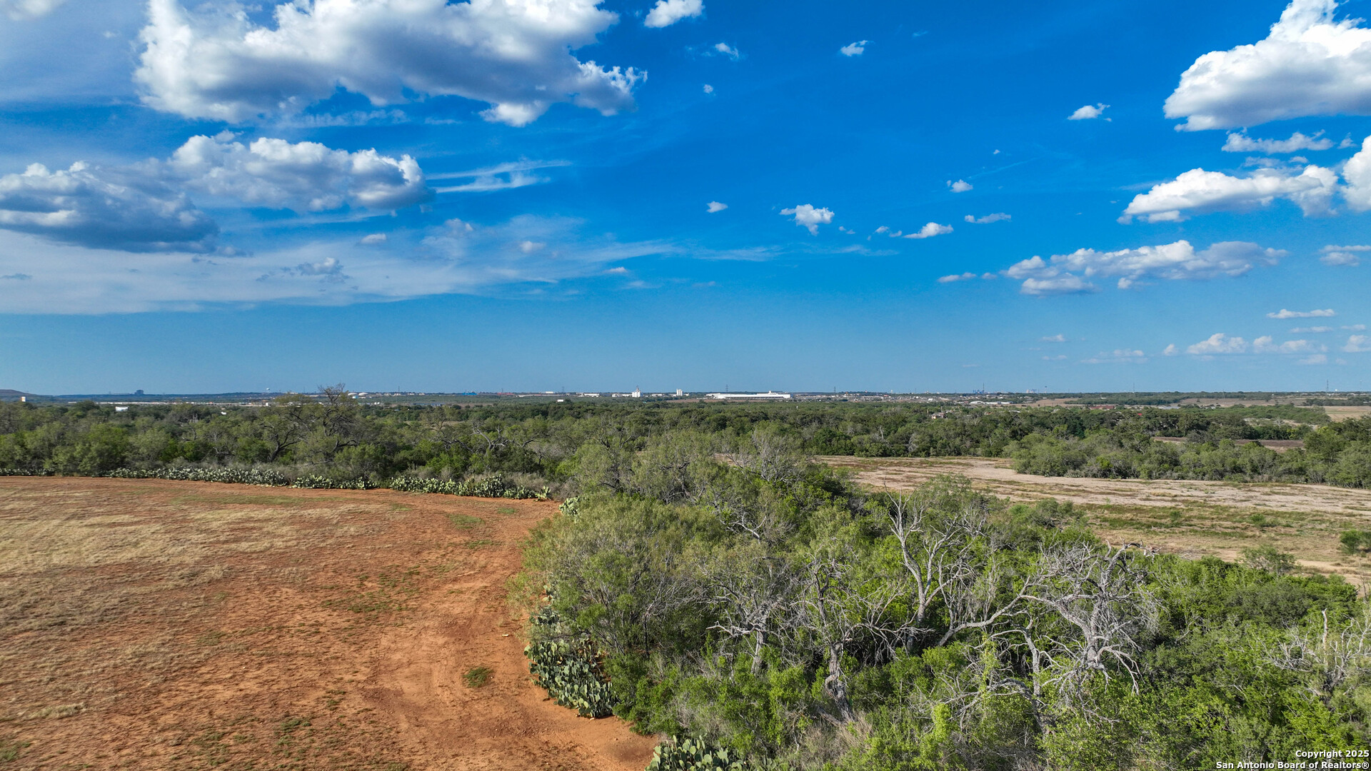 0 Von Ormy Road Von Ormy, TX 78073 - Photo 2 of 20 a view of a lake with a yard
