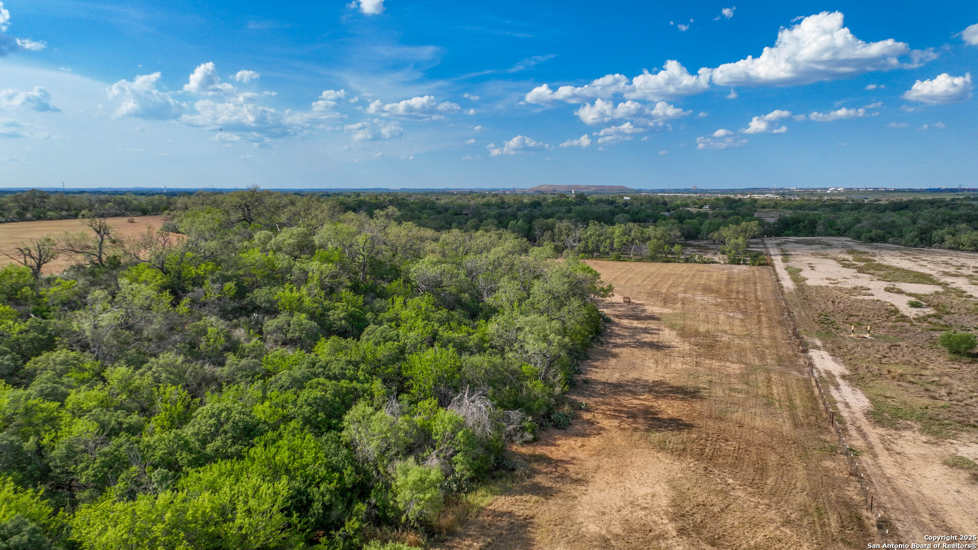 0 Von Ormy Road Von Ormy, TX 78073 - Photo 4 of 20 a view of a lake with a yard