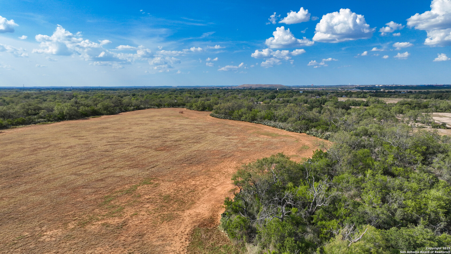 0 Von Ormy Road Von Ormy, TX 78073 - Photo 7 of 20 a view of a balcony with an outdoor space and seating