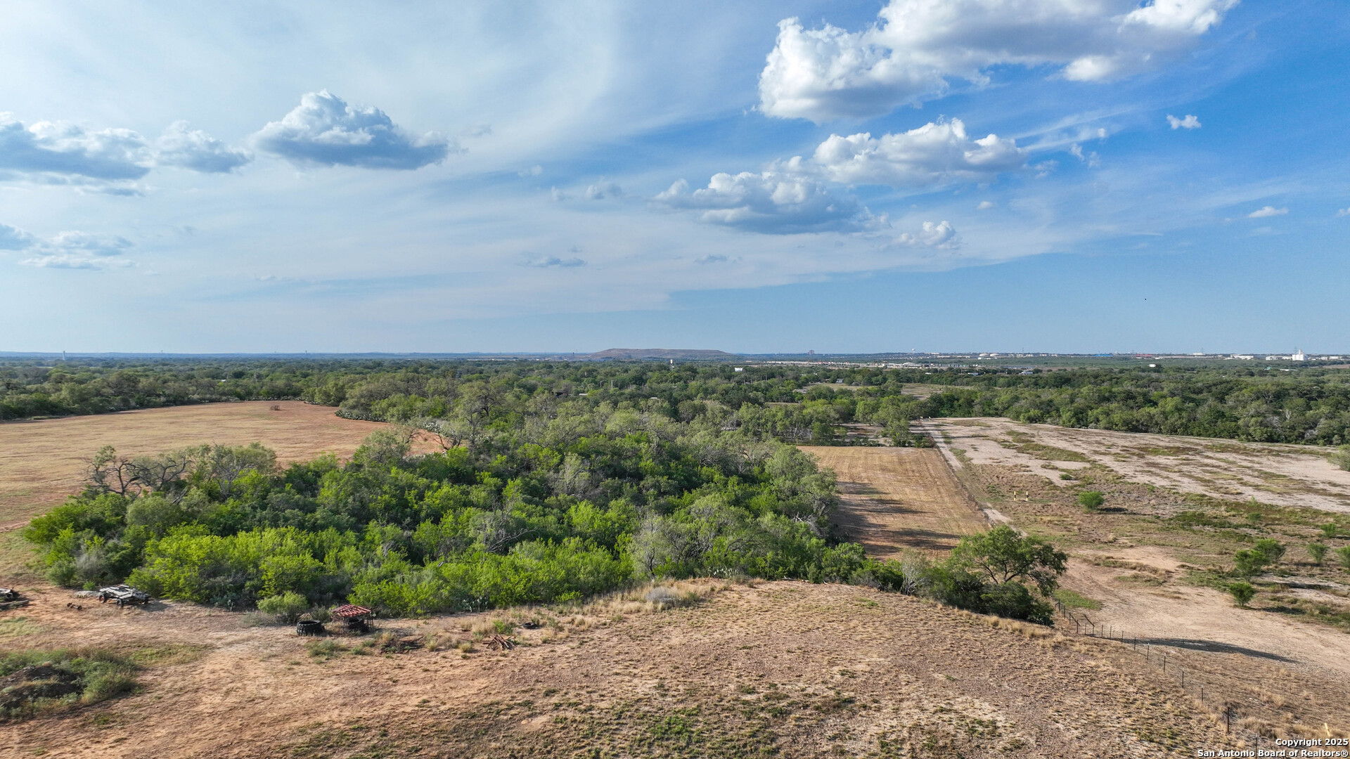 0 Von Ormy Road Von Ormy, TX 78073 - Photo 8 of 20 a view of a lake with mountains in the background