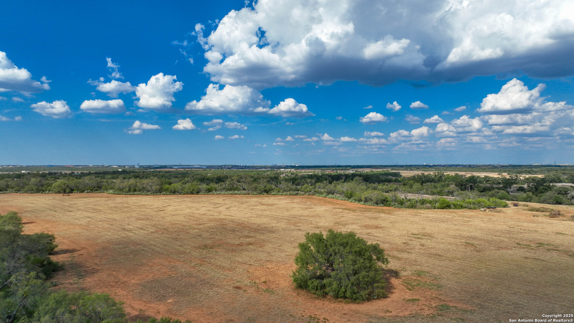 0 Von Ormy Road Von Ormy, TX 78073 - Photo 9 of 20 a view of a lake in middle of forest