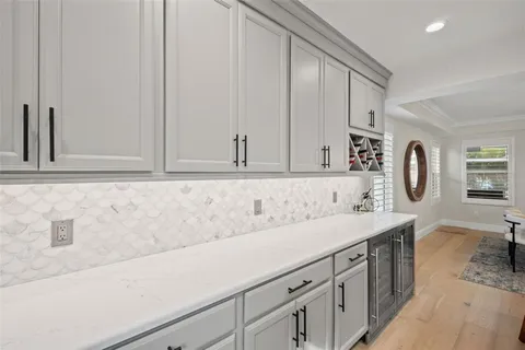 a kitchen with a sink a stove and refrigerator