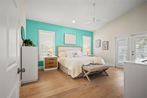 a bath tub sitting in a bathroom next to a window