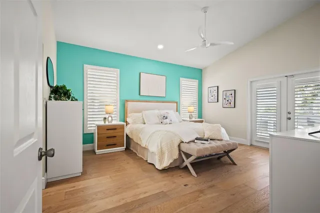 a bath tub sitting in a bathroom next to a window
