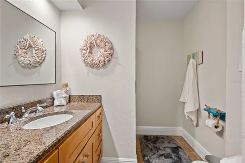 a view of a chairs and table in the patio