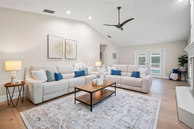 a view of a swimming pool with a patio