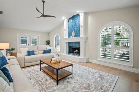 a view of a chairs and table in the patio