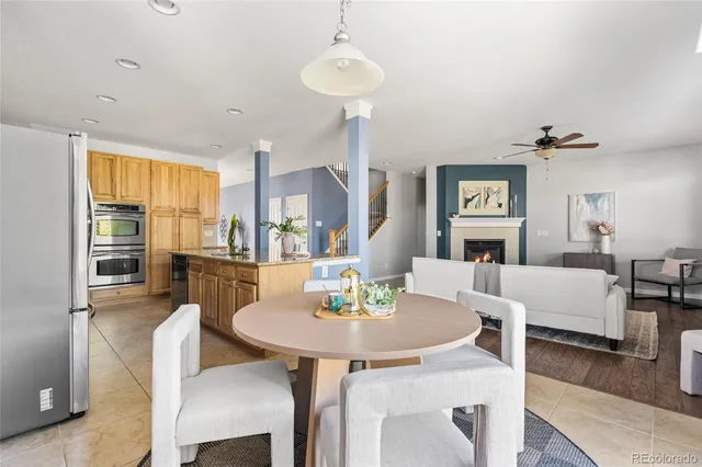 a spacious bedroom with two beds and a chandelier