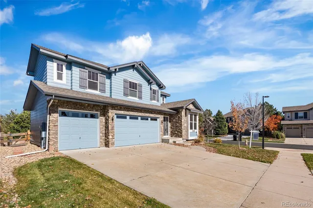 a view of a dining room with furniture and window