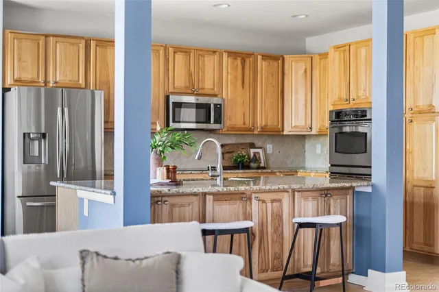 a bathroom with a sink a mirror and a shower