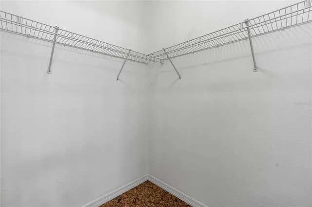 a view of a lake with houses in the back