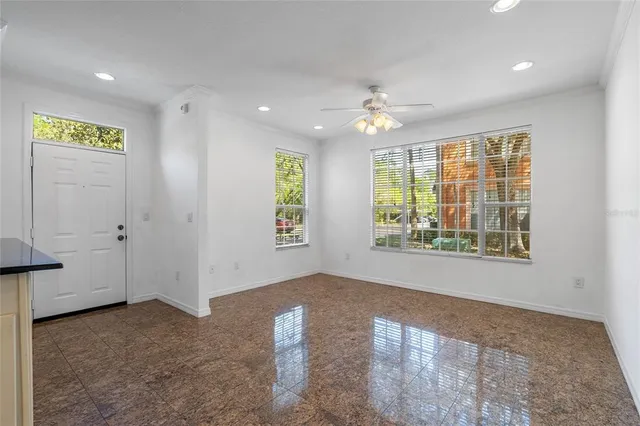 a view of hallway with window and hallway