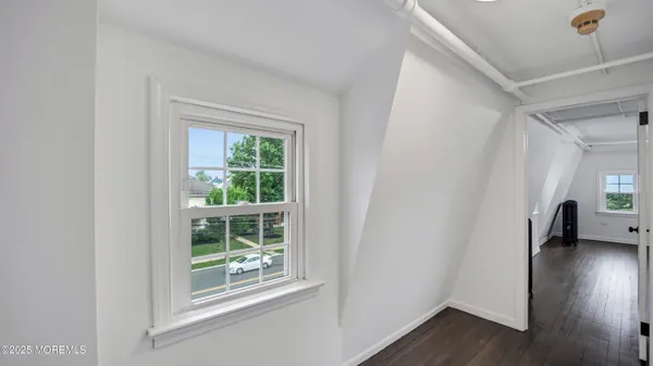 a view of livingroom with furniture and a window