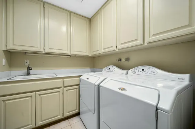 a view of a palm trees in front of a house