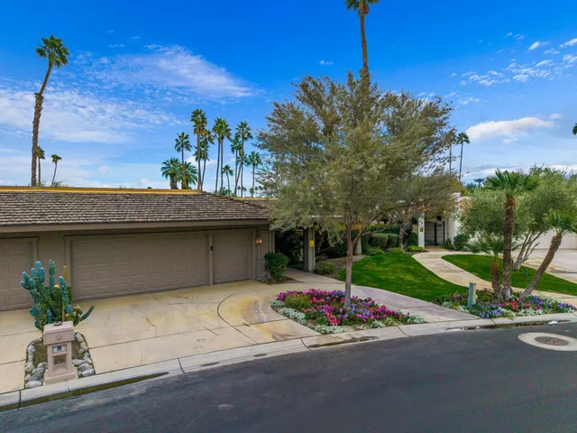 a view of a city with mountains in the background