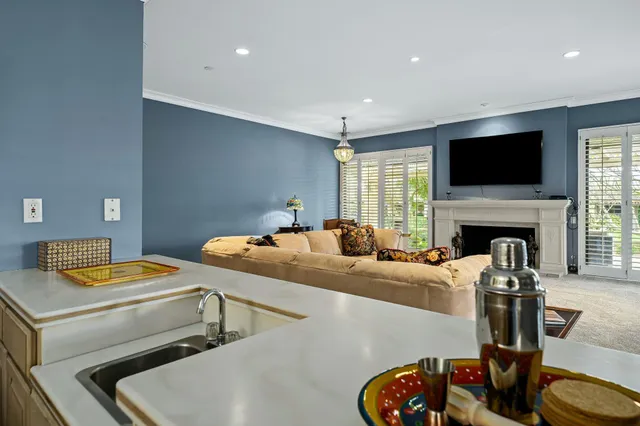 a room with a couch and a flat screen tv