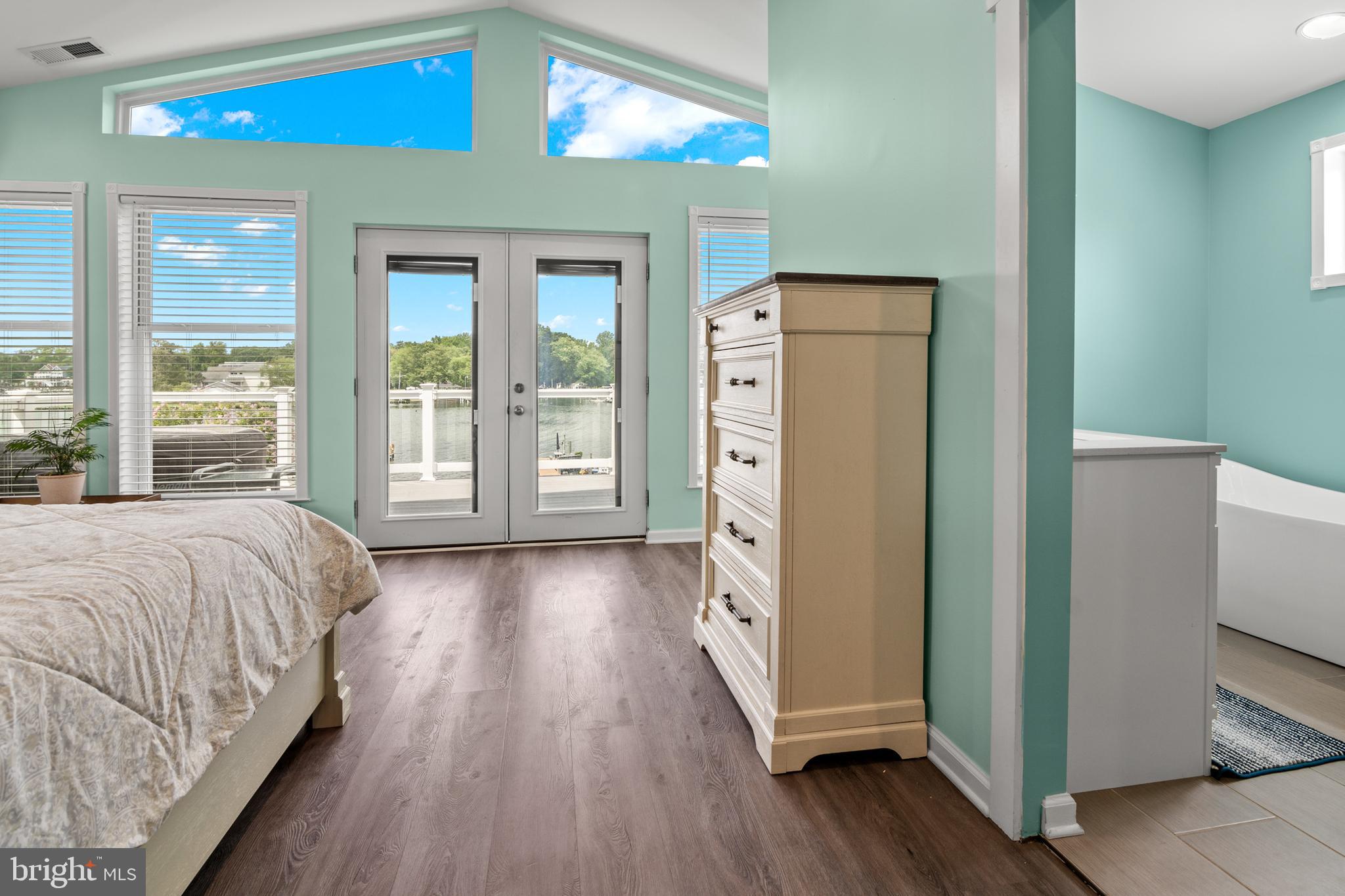 3608 Galloway Road Baltimore, MD 21220 - Photo 105 of 136 a spacious bedroom with a bed and a large window