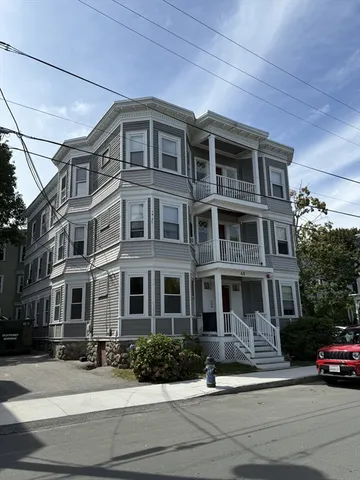 a front view of a building with street view