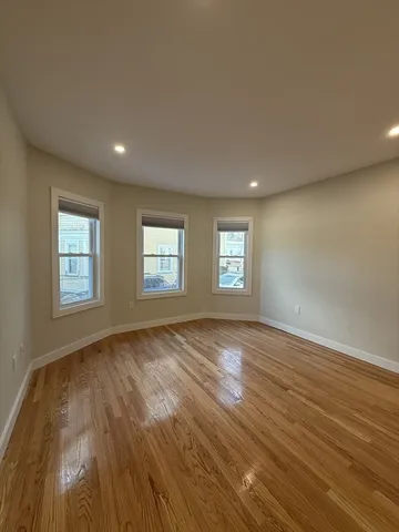 a view of an empty room and window
