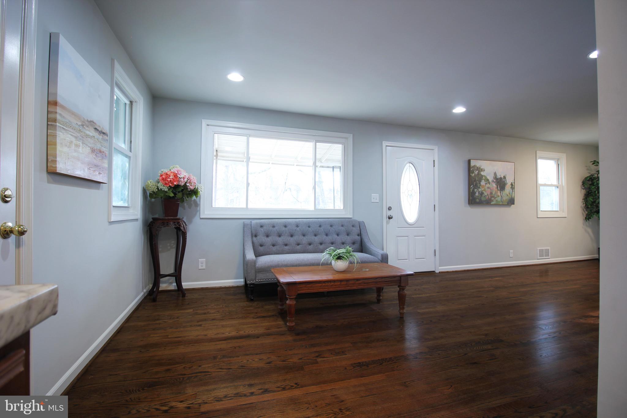 1139 Furnace Road Linthicum Heights, MD 21090 - Photo 4 of 21 a living room with furniture and a wooden floor