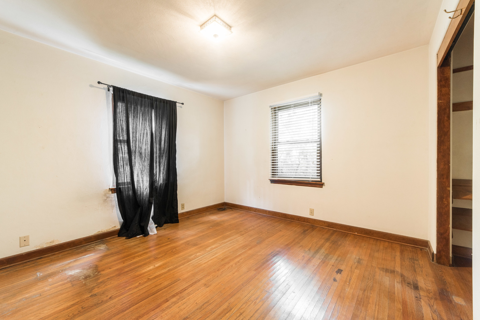 591 Normal Road DeKalb, IL 60115 - Photo 15 of 24 an empty room with wooden floor and a window