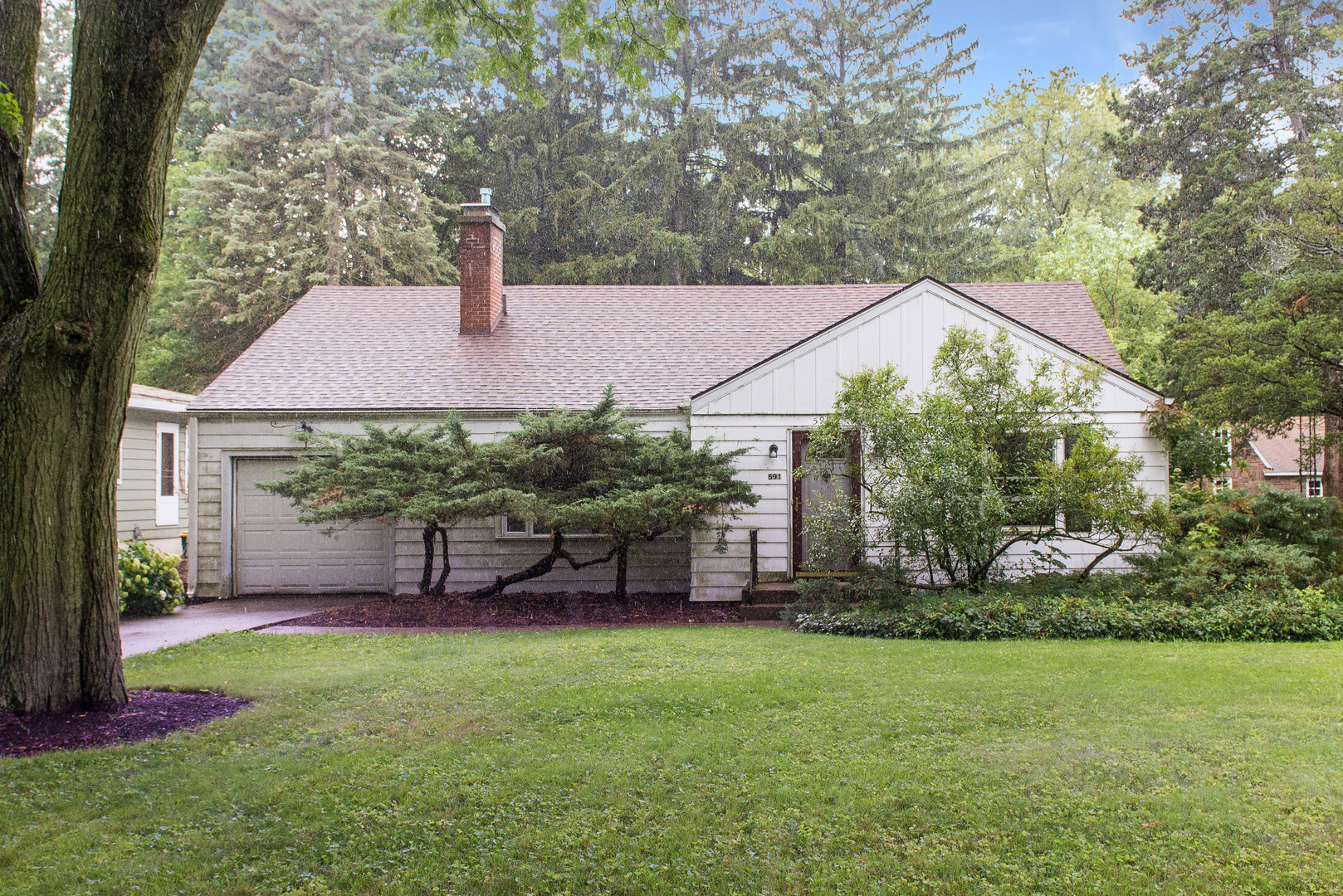 591 Normal Road DeKalb, IL 60115 - Photo 2 of 24 a backyard of a house with lots of green space