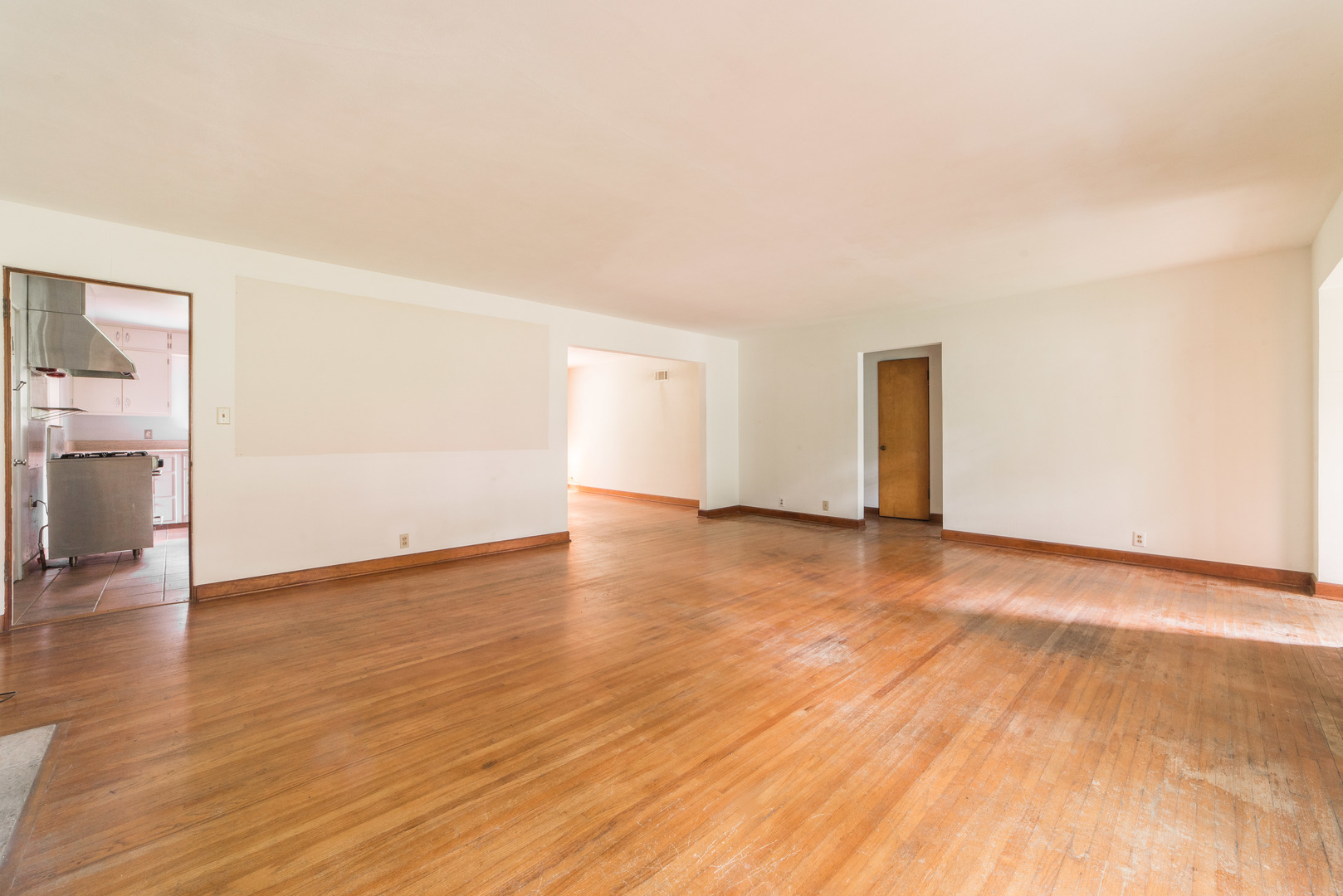 591 Normal Road DeKalb, IL 60115 - Photo 4 of 24 a view of an empty room and wooden floor