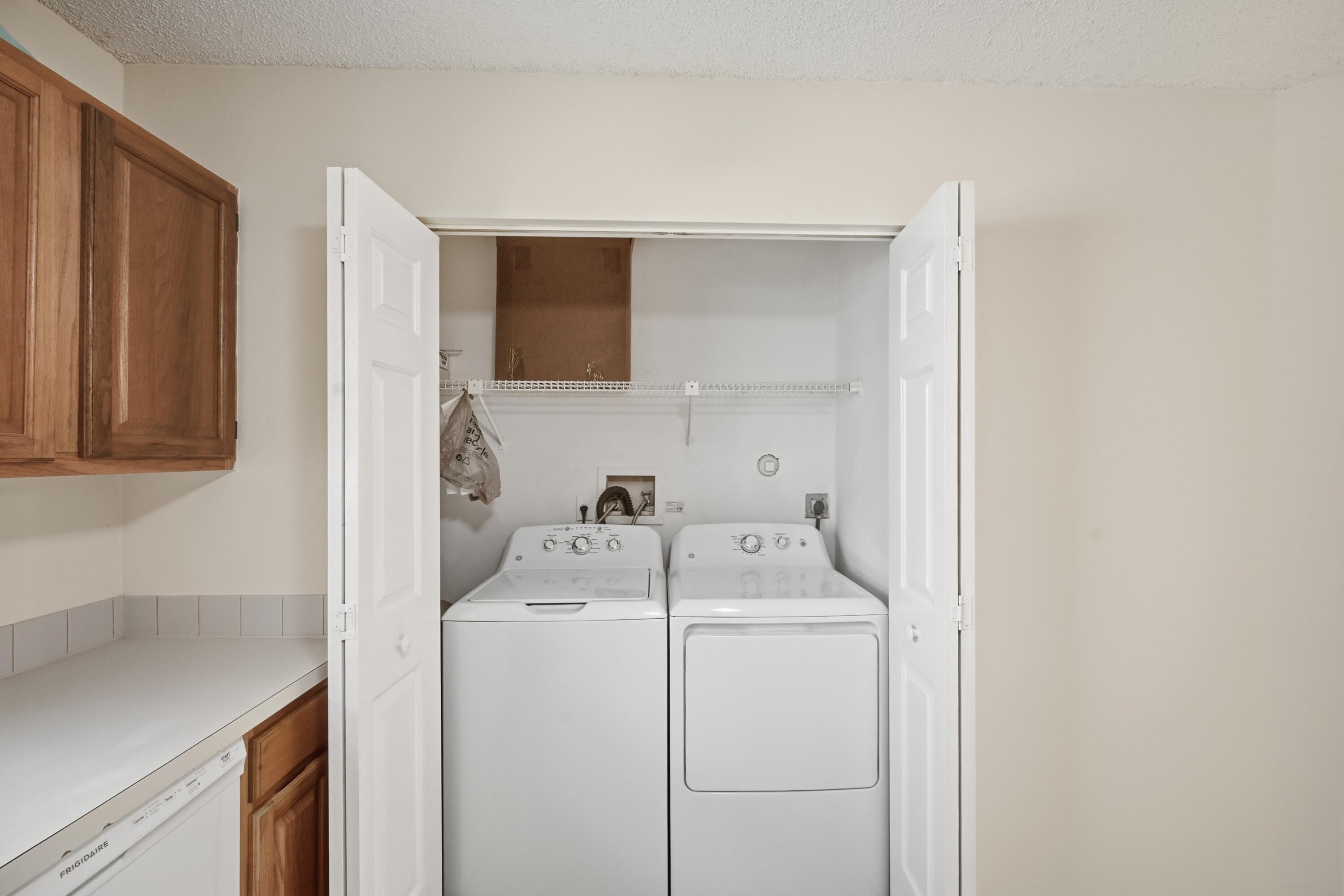 440 Ashwood Place Boca Raton, FL 33431 - Photo 13 of 32 a utility room with dryer and washer