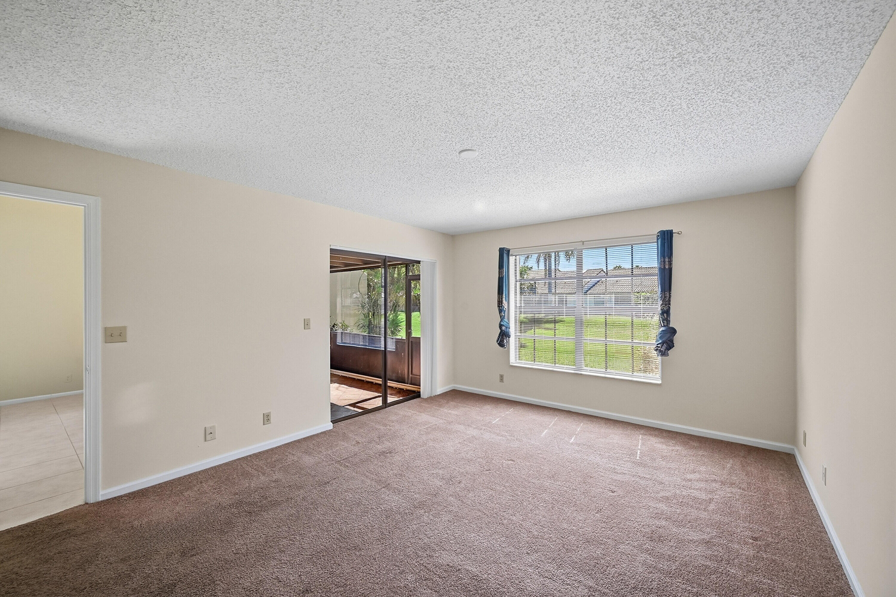 440 Ashwood Place Boca Raton, FL 33431 - Photo 19 of 32 a view of an empty room with a window