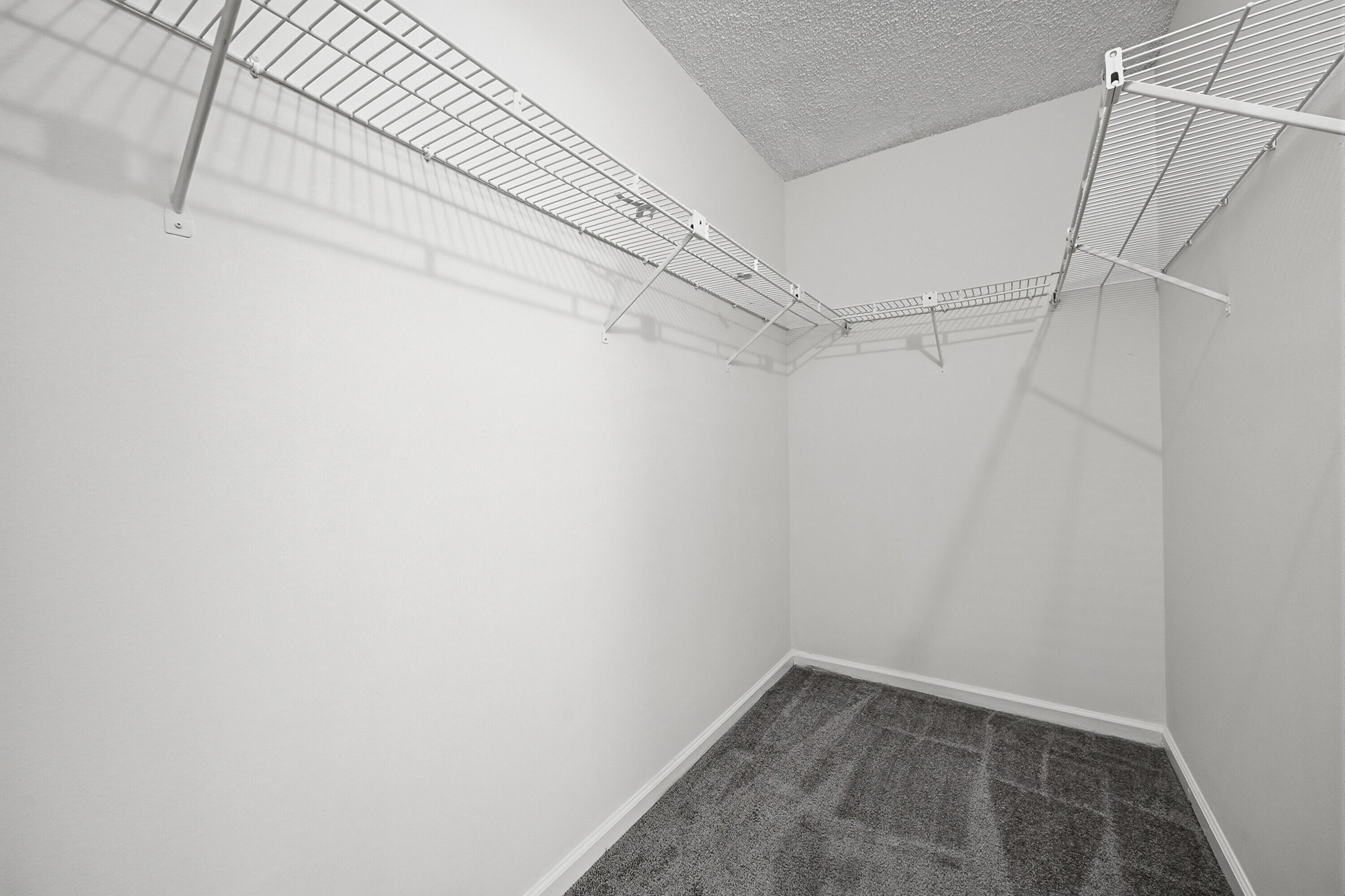 440 Ashwood Place Boca Raton, FL 33431 - Photo 23 of 32 a view of a room with racks on the wall