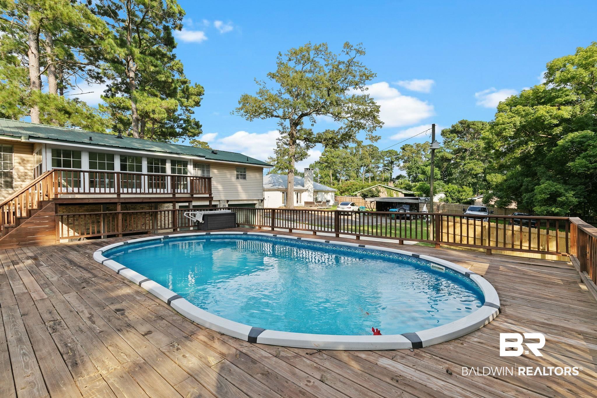 14 Lee Circle Daphne, AL 36527 - Photo 65 of 83 View of swimming pool featuring a wooden deck