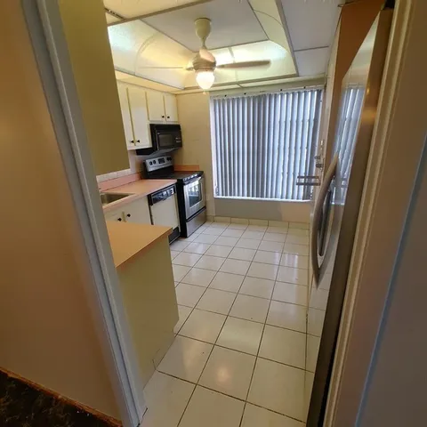 a view of a utility room with washer and dryer