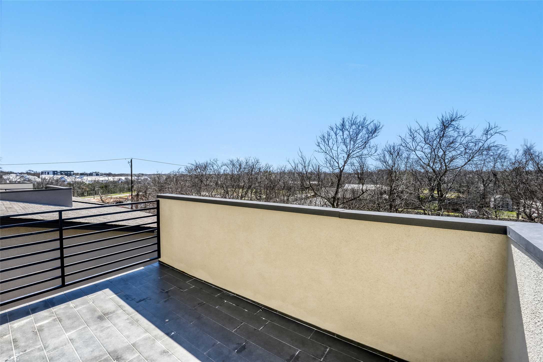 5002 Pecan Springs Road, Unit 6 Austin, TX 78723 - Photo 16 of 29 a view of a terrace with skyline