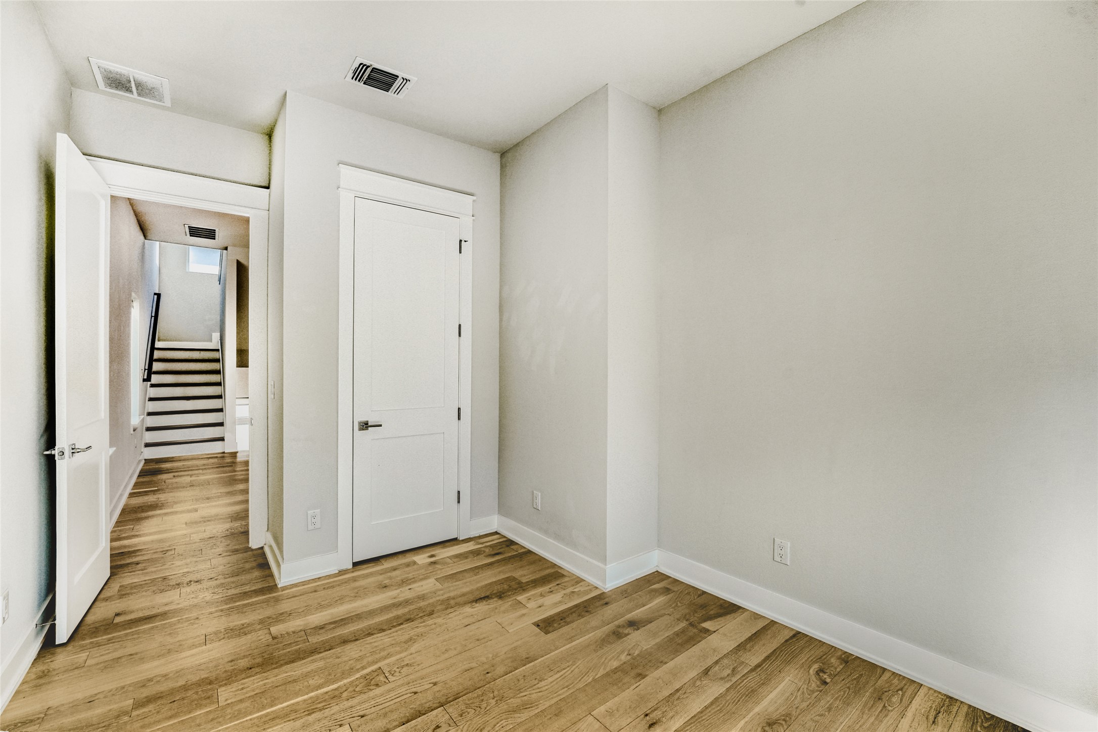 5002 Pecan Springs Road, Unit 6 Austin, TX 78723 - Photo 18 of 29 a view of a hallway with wooden floor