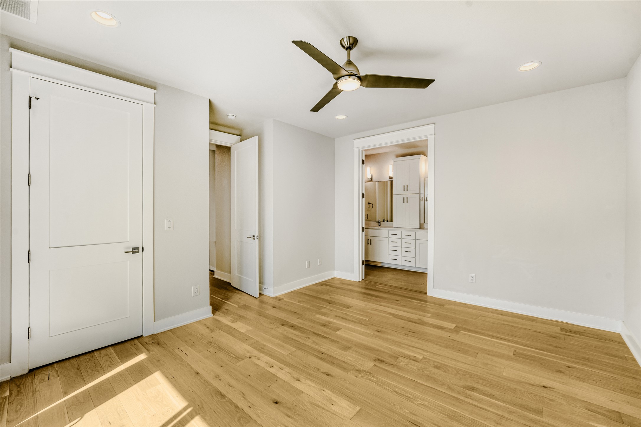 5002 Pecan Springs Road, Unit 6 Austin, TX 78723 - Photo 20 of 29 a view of an empty room and wooden floor
