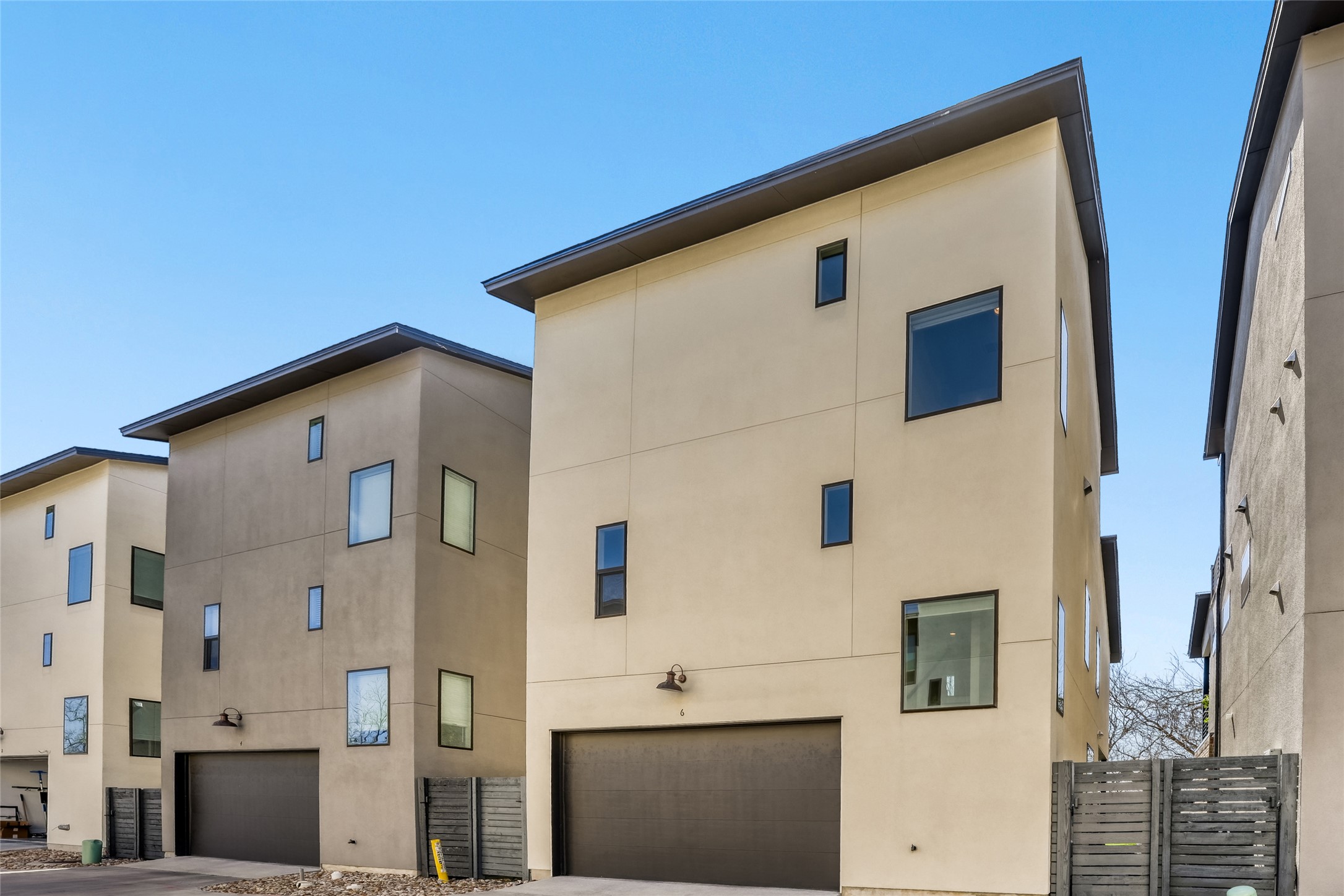 5002 Pecan Springs Road, Unit 6 Austin, TX 78723 - Photo 28 of 29 a front view of a house with large windows