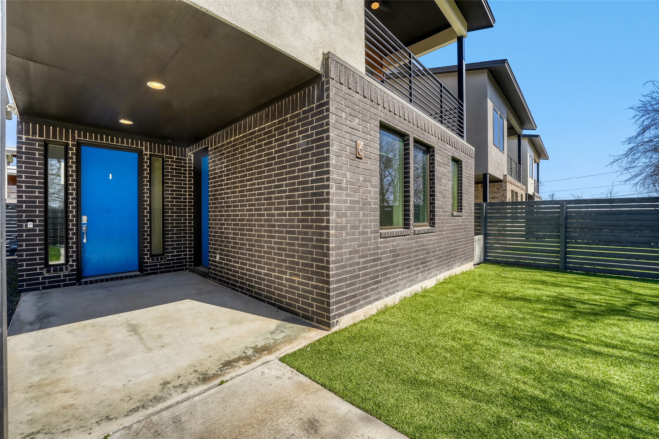 5002 Pecan Springs Road, Unit 6 Austin, TX 78723 - Photo 3 of 29 a view of backyard with a large tree