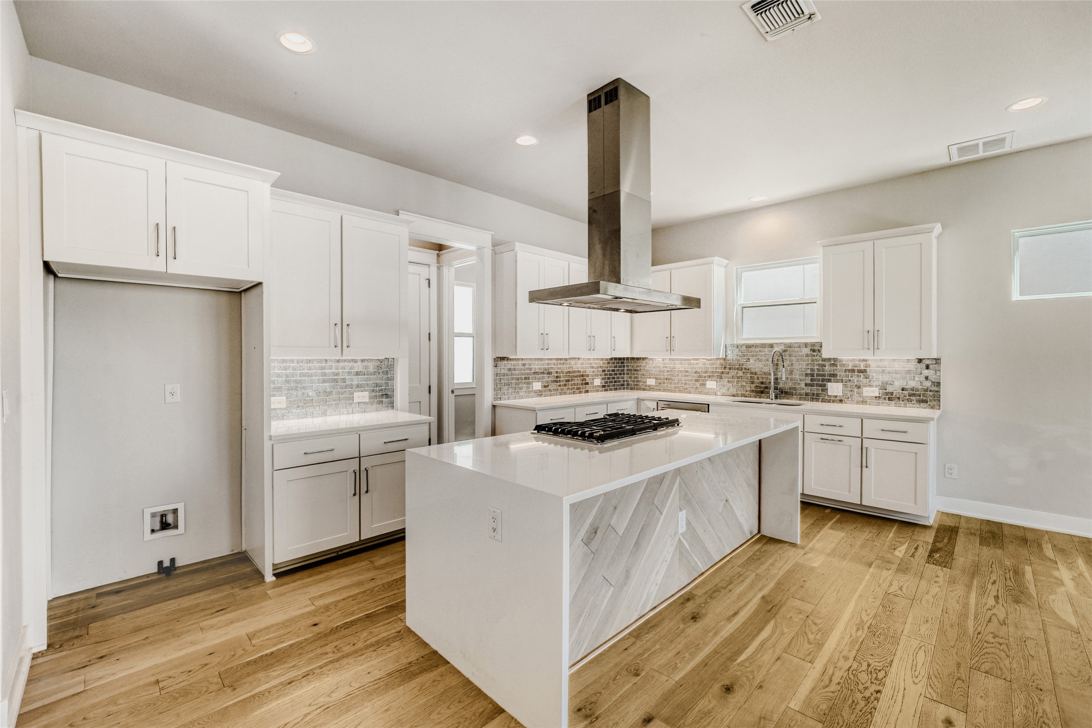 5002 Pecan Springs Road, Unit 6 Austin, TX 78723 - Photo 6 of 29 a kitchen with a sink stove and refrigerator