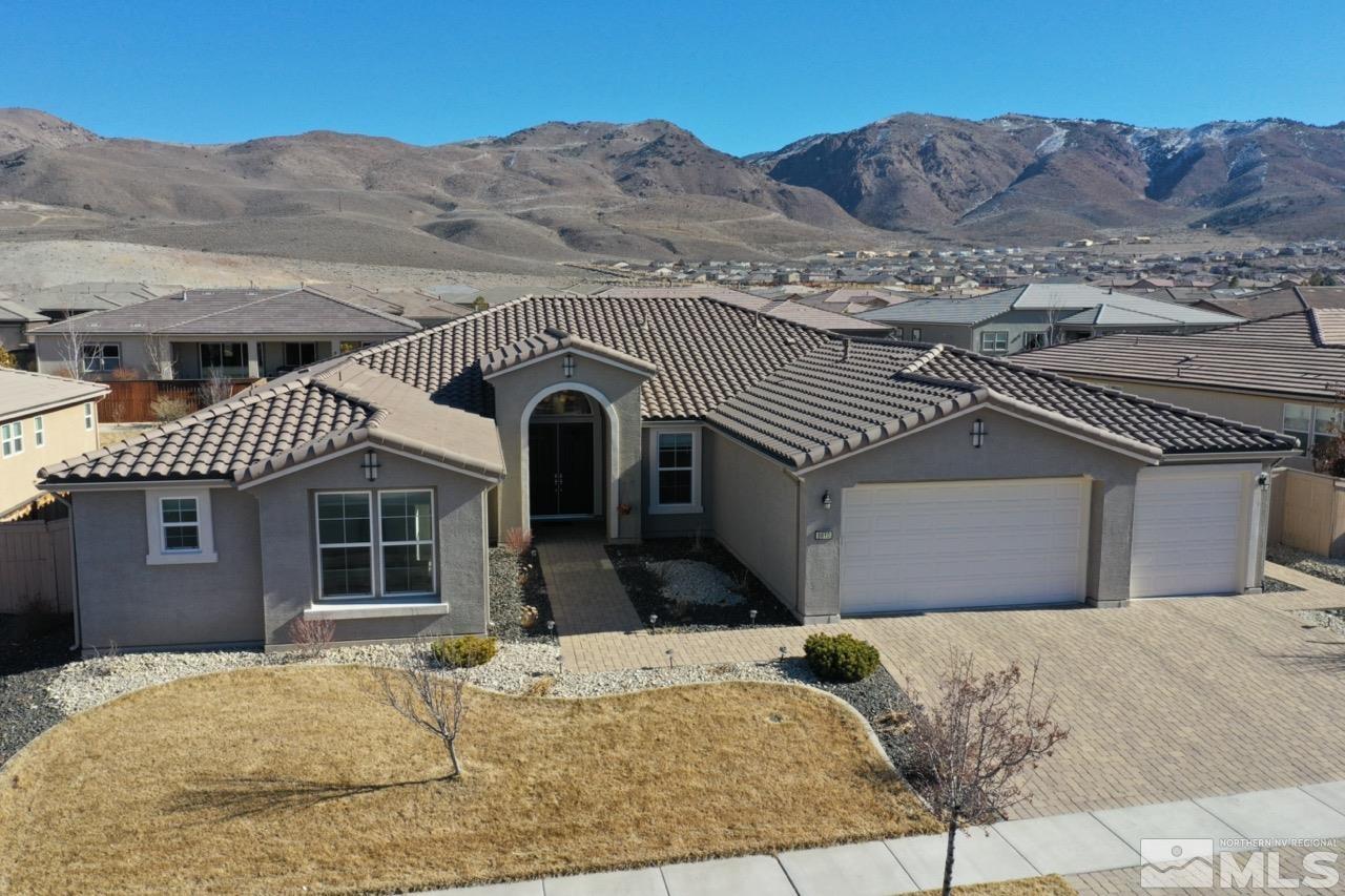 9810 Kerrydale Court Reno, NV 89521 - Photo 1 of 40 a front view of a house with a yard