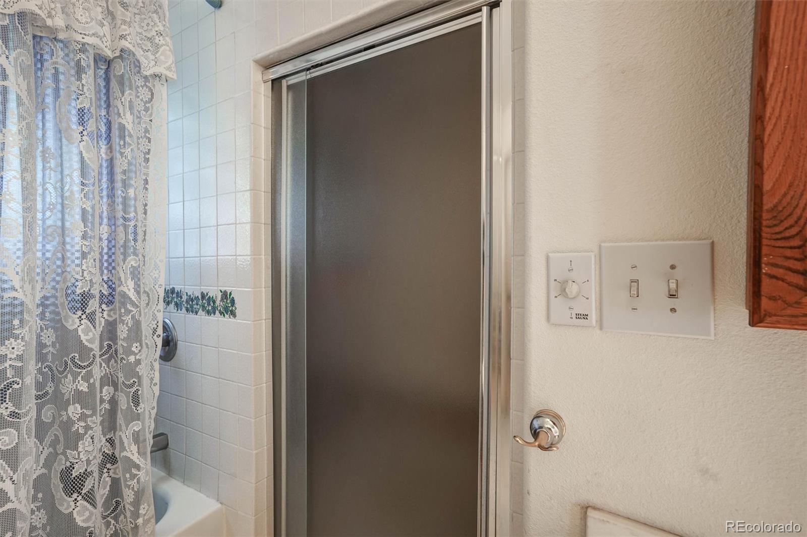 1206 Biddle Street Georgetown, CO 80444 - Photo 21 of 32 a bathroom with a shower